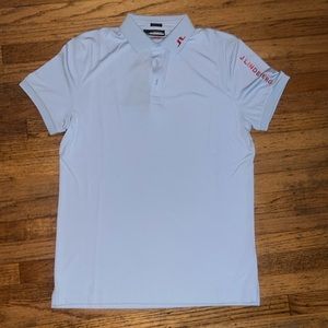 Medium Regular Fit J. Lindeberg light blue polo with orange accents.